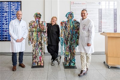 Prof. Dr. Axel Goßmann, HA Schult und Prof. Dr. Claus F. Eisenberger mit den "Medical Men"